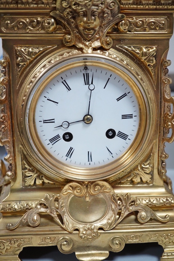 A 19th century French ormolu clock, striking on a bell, 34cm high. Condition - good